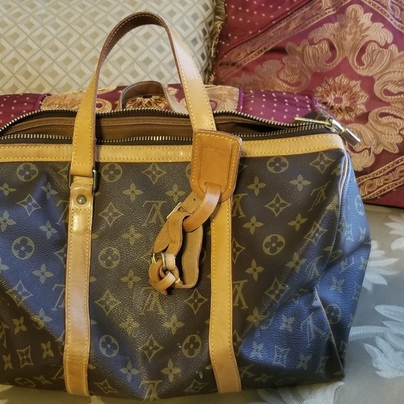 SOLD. LV Keepall Sac Souple 35 Travel Bag - Picture 2 of 8